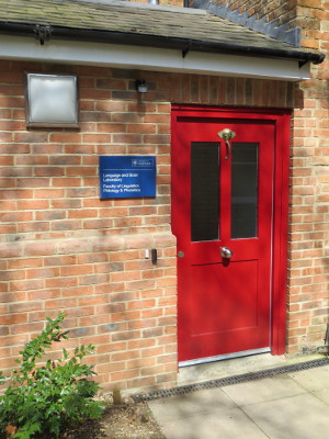 A photograph of the Language and Brain Laboratory front door