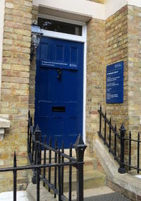 Blue Entrance Door to the Wellington Square 37